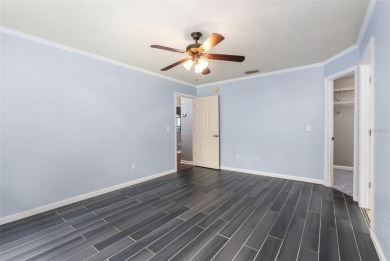 Welcome to this beautiful 3-bedroom, 2-bath home nestled in the on Turkey Creek Golf and Country Club in Florida - for sale on GolfHomes.com, golf home, golf lot