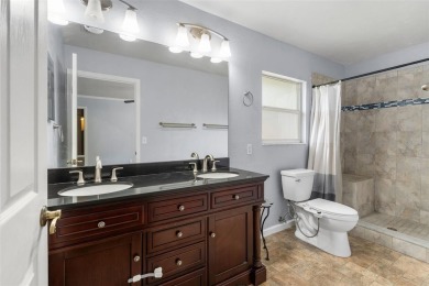 Welcome to this beautiful 3-bedroom, 2-bath home nestled in the on Turkey Creek Golf and Country Club in Florida - for sale on GolfHomes.com, golf home, golf lot