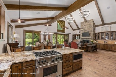 Introducing a rare gem that combines the perfect location with on Snake River Sporting Club in Wyoming - for sale on GolfHomes.com, golf home, golf lot