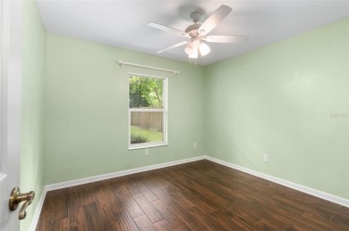 Welcome to this beautiful 3-bedroom, 2-bath home nestled in the on Turkey Creek Golf and Country Club in Florida - for sale on GolfHomes.com, golf home, golf lot