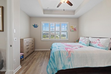 Escape to Paradise in this Barbuda Villa on a POND! This beauty on LPGA International Golf Course in Florida - for sale on GolfHomes.com, golf home, golf lot