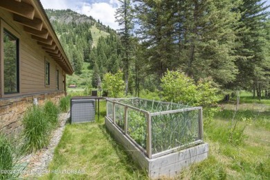 Introducing a rare gem that combines the perfect location with on Snake River Sporting Club in Wyoming - for sale on GolfHomes.com, golf home, golf lot