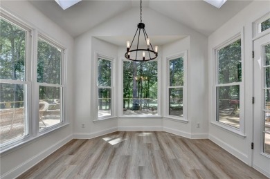 Discover a meticulously designed home that seamlessly blends on Canongate At Olde Atlanta Golf Club in Georgia - for sale on GolfHomes.com, golf home, golf lot