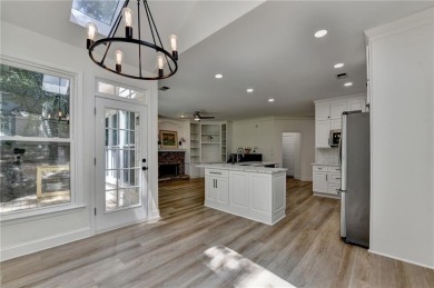 Discover a meticulously designed home that seamlessly blends on Canongate At Olde Atlanta Golf Club in Georgia - for sale on GolfHomes.com, golf home, golf lot