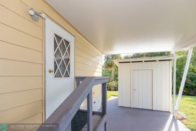 Step into this beautifully maintained 2-bedroom, 2-bath mobile on Vero Beach Country Club in Florida - for sale on GolfHomes.com, golf home, golf lot