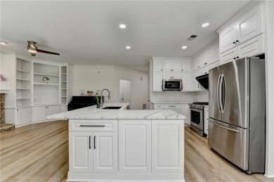 Discover a meticulously designed home that seamlessly blends on Canongate At Olde Atlanta Golf Club in Georgia - for sale on GolfHomes.com, golf home, golf lot