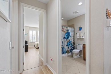 Escape to Paradise in this Barbuda Villa on a POND! This beauty on LPGA International Golf Course in Florida - for sale on GolfHomes.com, golf home, golf lot