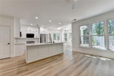 Discover a meticulously designed home that seamlessly blends on Canongate At Olde Atlanta Golf Club in Georgia - for sale on GolfHomes.com, golf home, golf lot