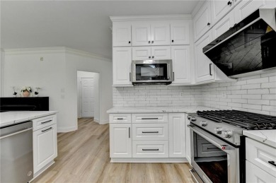 Discover a meticulously designed home that seamlessly blends on Canongate At Olde Atlanta Golf Club in Georgia - for sale on GolfHomes.com, golf home, golf lot
