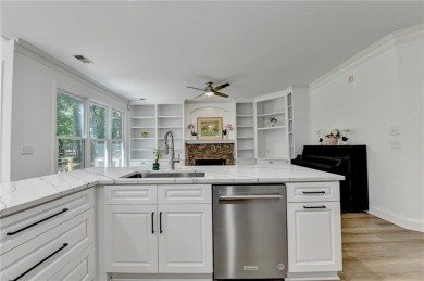 Discover a meticulously designed home that seamlessly blends on Canongate At Olde Atlanta Golf Club in Georgia - for sale on GolfHomes.com, golf home, golf lot