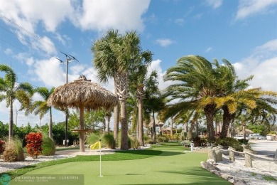 Step into this beautifully maintained 2-bedroom, 2-bath mobile on Vero Beach Country Club in Florida - for sale on GolfHomes.com, golf home, golf lot