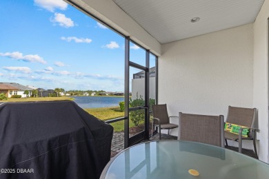 Escape to Paradise in this Barbuda Villa on a POND! This beauty on LPGA International Golf Course in Florida - for sale on GolfHomes.com, golf home, golf lot