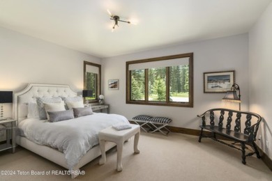 Introducing a rare gem that combines the perfect location with on Snake River Sporting Club in Wyoming - for sale on GolfHomes.com, golf home, golf lot