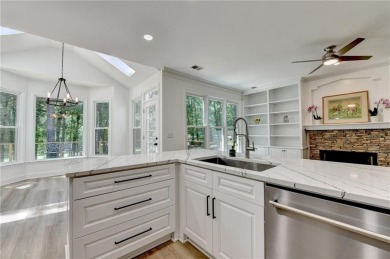 Discover a meticulously designed home that seamlessly blends on Canongate At Olde Atlanta Golf Club in Georgia - for sale on GolfHomes.com, golf home, golf lot