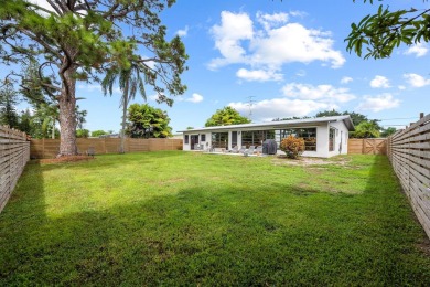 Charming 3 bedroom, 2 bathroom CBS construction home located on Club Med Sandpiper in Florida - for sale on GolfHomes.com, golf home, golf lot