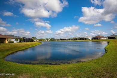 Escape to Paradise in this Barbuda Villa on a POND! This beauty on LPGA International Golf Course in Florida - for sale on GolfHomes.com, golf home, golf lot