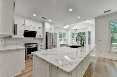 Discover a meticulously designed home that seamlessly blends on Canongate At Olde Atlanta Golf Club in Georgia - for sale on GolfHomes.com, golf home, golf lot