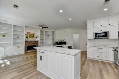 Discover a meticulously designed home that seamlessly blends on Canongate At Olde Atlanta Golf Club in Georgia - for sale on GolfHomes.com, golf home, golf lot