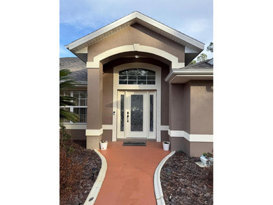 Step into this meticulously maintained three-bedroom, two-bath on The Grand Club Cypress Course in Florida - for sale on GolfHomes.com, golf home, golf lot