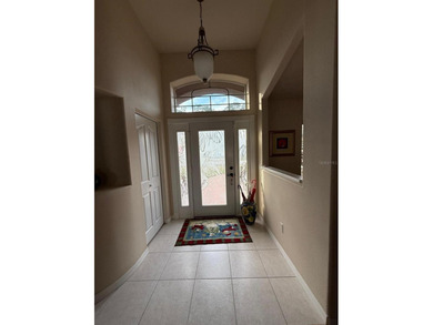 Step into this meticulously maintained three-bedroom, two-bath on The Grand Club Cypress Course in Florida - for sale on GolfHomes.com, golf home, golf lot