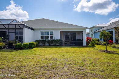 Escape to Paradise in this Barbuda Villa on a POND! This beauty on LPGA International Golf Course in Florida - for sale on GolfHomes.com, golf home, golf lot
