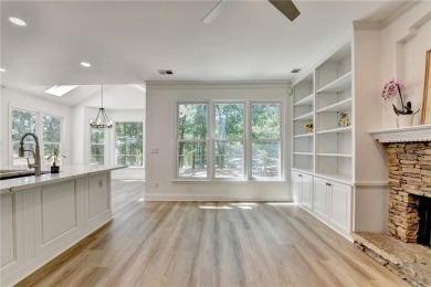 Discover a meticulously designed home that seamlessly blends on Canongate At Olde Atlanta Golf Club in Georgia - for sale on GolfHomes.com, golf home, golf lot