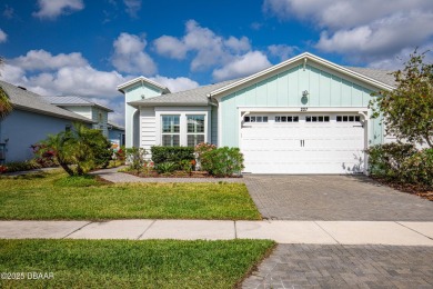 Escape to Paradise in this Barbuda Villa on a POND! This beauty on LPGA International Golf Course in Florida - for sale on GolfHomes.com, golf home, golf lot