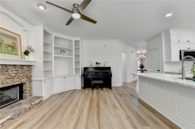 Discover a meticulously designed home that seamlessly blends on Canongate At Olde Atlanta Golf Club in Georgia - for sale on GolfHomes.com, golf home, golf lot