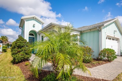 Escape to Paradise in this Barbuda Villa on a POND! This beauty on LPGA International Golf Course in Florida - for sale on GolfHomes.com, golf home, golf lot