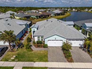 Escape to Paradise in this Barbuda Villa on a POND! This beauty on LPGA International Golf Course in Florida - for sale on GolfHomes.com, golf home, golf lot