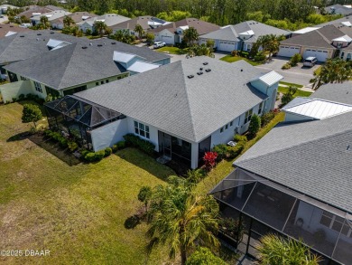 Escape to Paradise in this Barbuda Villa on a POND! This beauty on LPGA International Golf Course in Florida - for sale on GolfHomes.com, golf home, golf lot