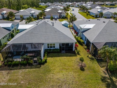 Escape to Paradise in this Barbuda Villa on a POND! This beauty on LPGA International Golf Course in Florida - for sale on GolfHomes.com, golf home, golf lot