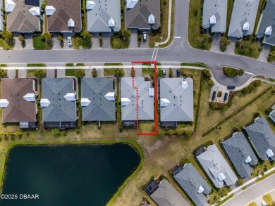Escape to Paradise in this Barbuda Villa on a POND! This beauty on LPGA International Golf Course in Florida - for sale on GolfHomes.com, golf home, golf lot