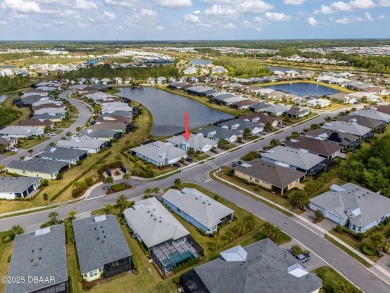 Escape to Paradise in this Barbuda Villa on a POND! This beauty on LPGA International Golf Course in Florida - for sale on GolfHomes.com, golf home, golf lot
