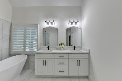 Discover a meticulously designed home that seamlessly blends on Canongate At Olde Atlanta Golf Club in Georgia - for sale on GolfHomes.com, golf home, golf lot