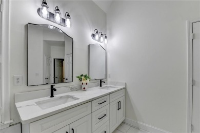 Discover a meticulously designed home that seamlessly blends on Canongate At Olde Atlanta Golf Club in Georgia - for sale on GolfHomes.com, golf home, golf lot