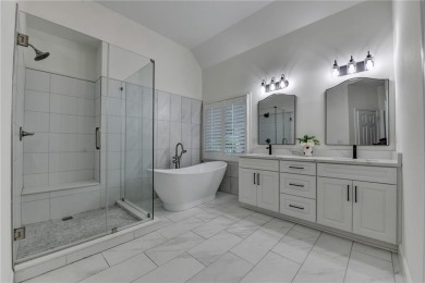 Discover a meticulously designed home that seamlessly blends on Canongate At Olde Atlanta Golf Club in Georgia - for sale on GolfHomes.com, golf home, golf lot