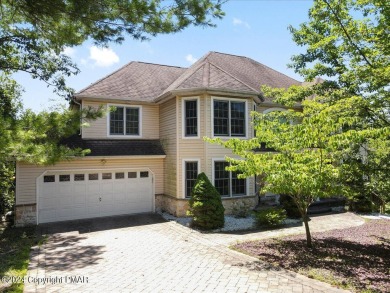 Step inside this 4-bed, 2.5 bath Colonial in the sought after on Country Club of the Poconos Golf Course in Pennsylvania - for sale on GolfHomes.com, golf home, golf lot