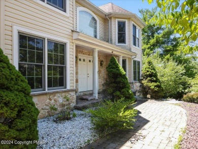 Step inside this 4-bed, 2.5 bath Colonial in the sought after on Country Club of the Poconos Golf Course in Pennsylvania - for sale on GolfHomes.com, golf home, golf lot