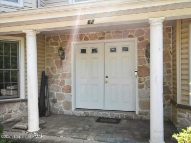 Step inside this 4-bed, 2.5 bath Colonial in the sought after on Country Club of the Poconos Golf Course in Pennsylvania - for sale on GolfHomes.com, golf home, golf lot