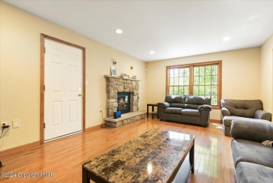 Step inside this 4-bed, 2.5 bath Colonial in the sought after on Country Club of the Poconos Golf Course in Pennsylvania - for sale on GolfHomes.com, golf home, golf lot