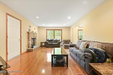 Step inside this 4-bed, 2.5 bath Colonial in the sought after on Country Club of the Poconos Golf Course in Pennsylvania - for sale on GolfHomes.com, golf home, golf lot