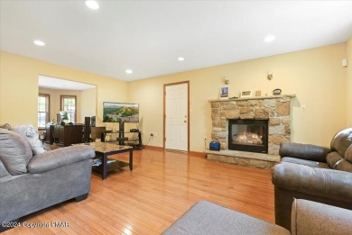 Step inside this 4-bed, 2.5 bath Colonial in the sought after on Country Club of the Poconos Golf Course in Pennsylvania - for sale on GolfHomes.com, golf home, golf lot