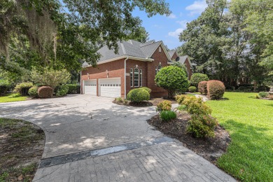 Nestled within the prestigious and serene gated community of on Coosaw Creek Country Club in South Carolina - for sale on GolfHomes.com, golf home, golf lot