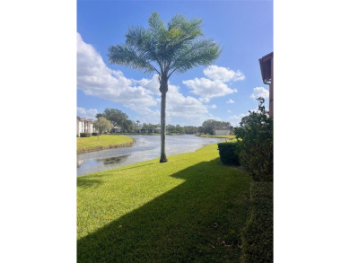 Welcome to this stunning 2-bedroom, 2-bathroom first-floor condo on East Lake Woodlands Country Club in Florida - for sale on GolfHomes.com, golf home, golf lot