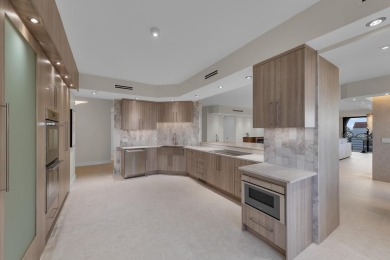 Over 3000 sqft of living space, this fully renovated turn-key PH on Boca Pointe Country Club in Florida - for sale on GolfHomes.com, golf home, golf lot