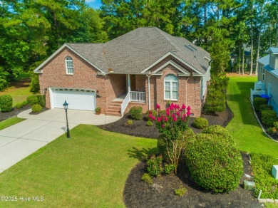 Nestled in a prestigious gated golf community, this brick home on Brunswick Plantation and Golf Resorts in North Carolina - for sale on GolfHomes.com, golf home, golf lot