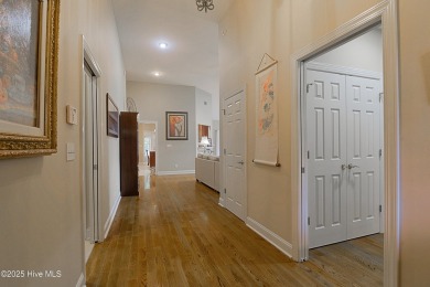Nestled in a prestigious gated golf community, this brick home on Brunswick Plantation and Golf Resorts in North Carolina - for sale on GolfHomes.com, golf home, golf lot