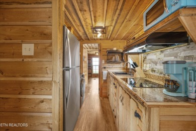 Discover the charm of this fully renovated two-bedroom on Laurel Valley Golf Course in Tennessee - for sale on GolfHomes.com, golf home, golf lot