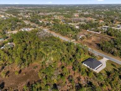 Discover the allure of this exceptional 1.24-acre wooded lot on Wedgefield Golf Club in Florida - for sale on GolfHomes.com, golf home, golf lot